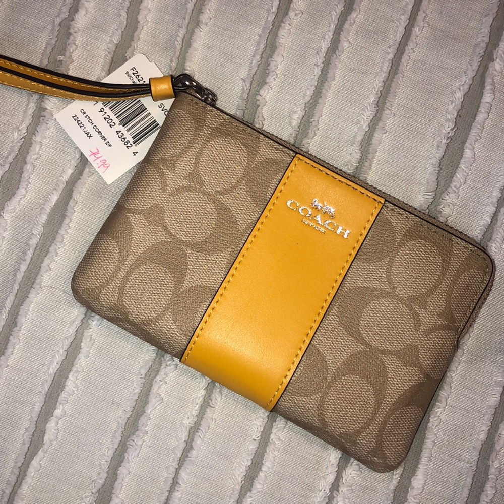 NWT Coach corner zip yellow wristlet